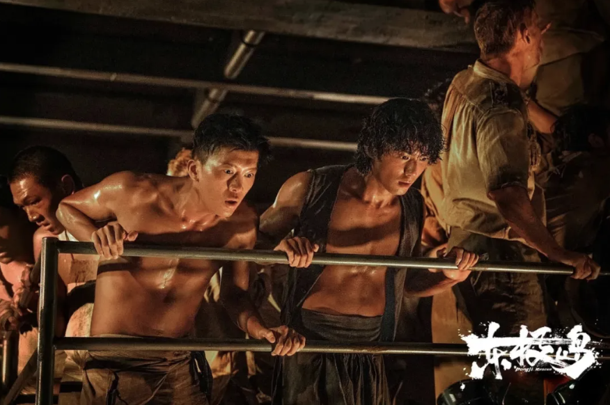 A group of men holding onto metal bars
AI-generated content may be incorrect.